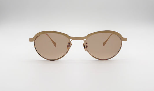Front view of Vincent Catani Theodor round sunglasses, brushed gold frame with brown lenses