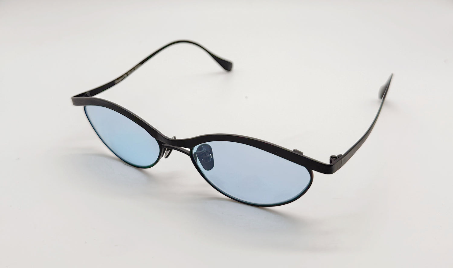 Vincent Catani Alma Sky Blue cat-eye sunglasses with black frame and light blue lenses, limited edition