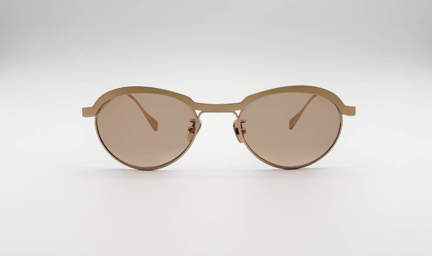 Front view of Vincent Catani Theodor round sunglasses, brushed gold frame with brown lenses