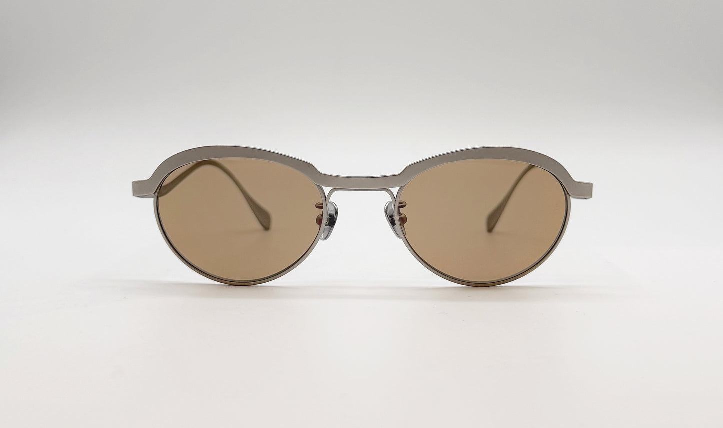 Front view of Vincent Catani Theodor round sunglasses, metal frame with brown lenses