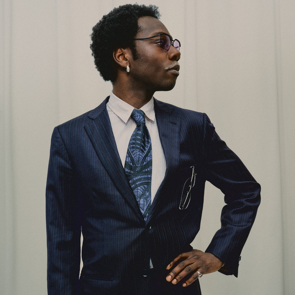Portrait of a model in Vincent Catani Benno purple titanium sunglasses