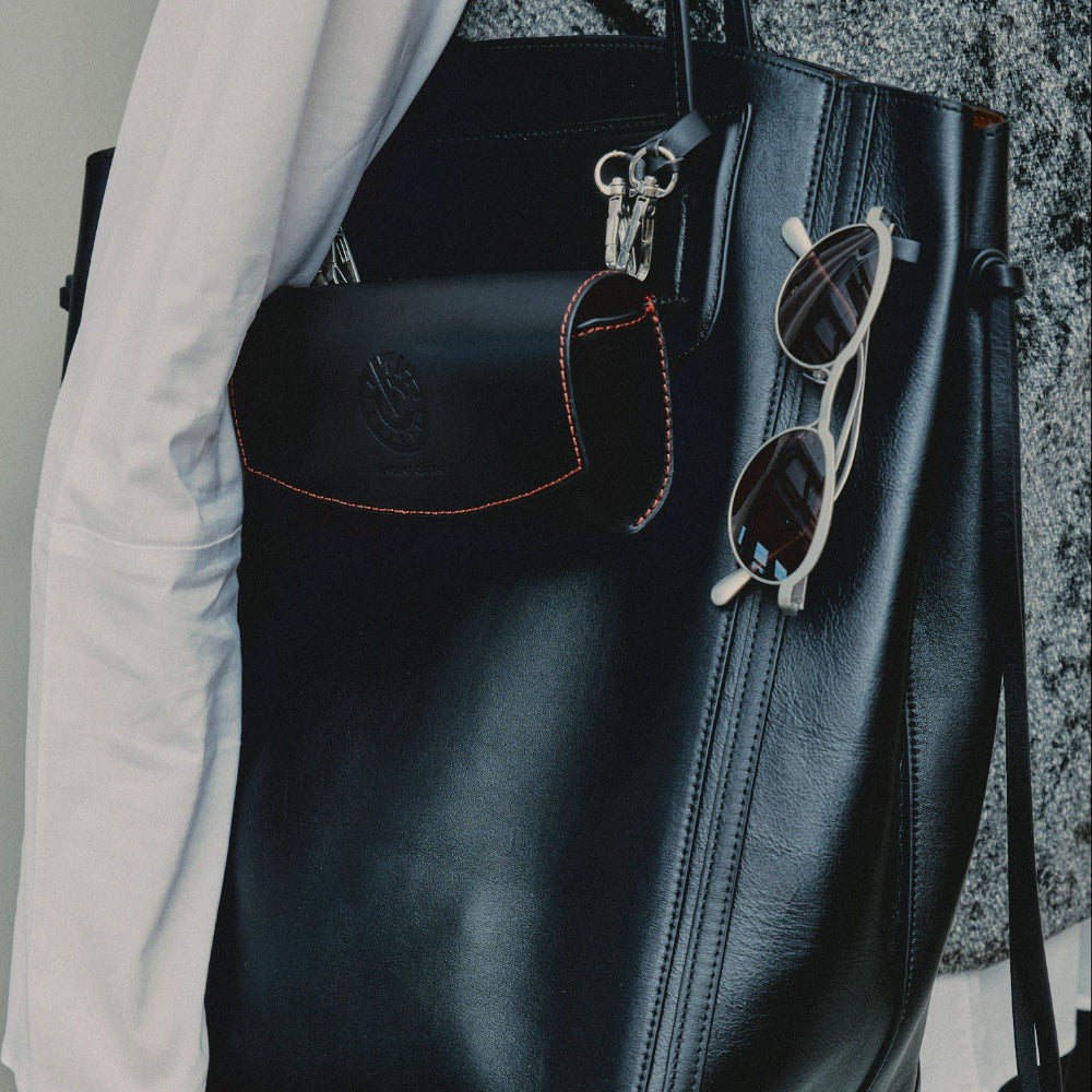 Portrait of a model in Vincent Catani Theodor metal and black round sunglasses